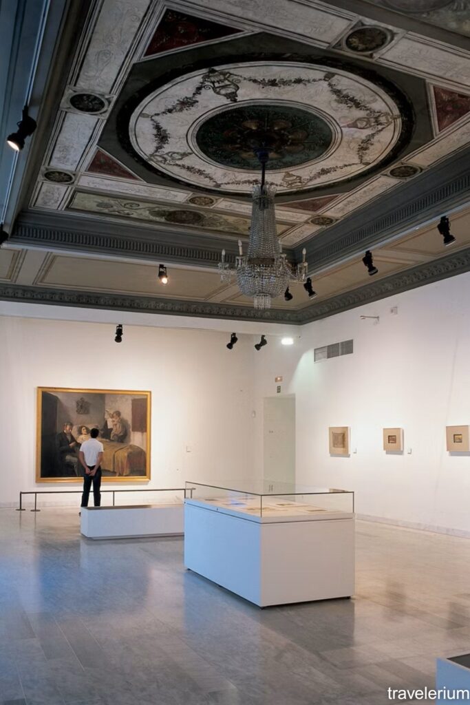 Science and Charity by Pablo Picasso being viewed in main hall of Picasso Museum